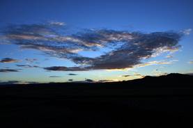 Die Wolken spiegeln die Sonne wider